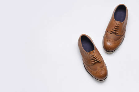 Little boy shoes on white backgroundの写真素材