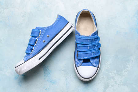 Child's shoes on light backgroundの写真素材