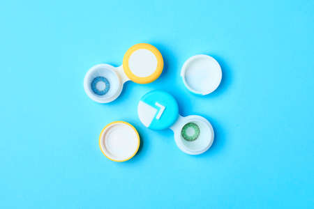 Containers with contact lenses on color backgroundの写真素材