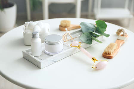 Natural bathing supplies and cosmetics on table in bathroom. Ecology conceptの写真素材