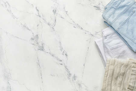 Stylish jeans pants on white backgroundの写真素材