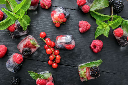 Ice with frozen berries on boardの写真素材