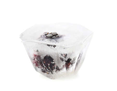 Ice with frozen berry on white backgroundの写真素材