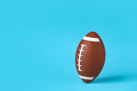 Rugby ball on color backgroundの写真素材