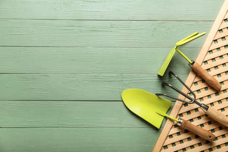 Set of gardening supplies on wooden backgroundの写真素材