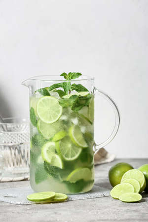 Jug of fresh mojito on tableの写真素材