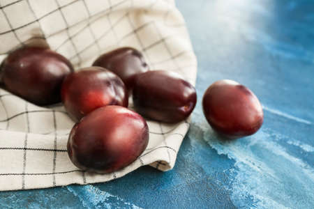 Tasty sweet plums on color backgroundの写真素材