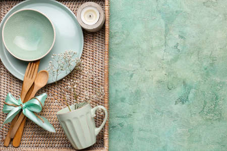 Beautiful table setting on color backgroundの写真素材