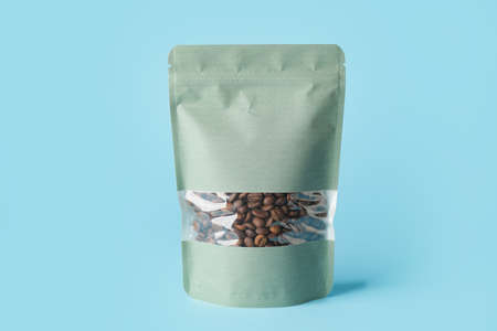 Blank coffee bag on color background