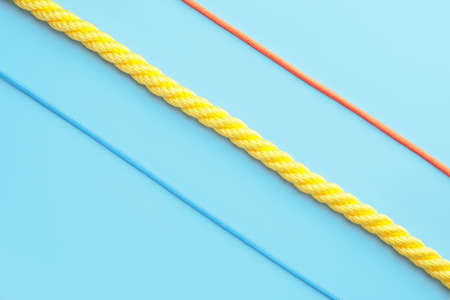 Long ropes on color backgroundの写真素材