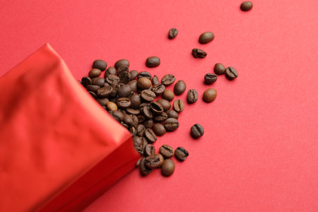 Blank coffee bag on color backgroundの写真素材