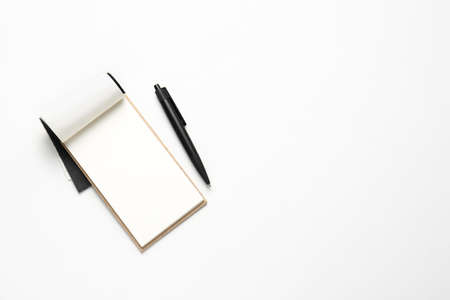 Notebook and pen on white backgroundの写真素材