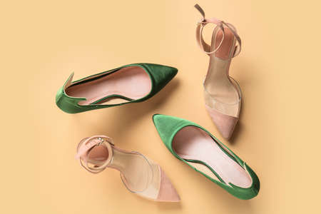 Stylish female shoes on color backgroundの写真素材