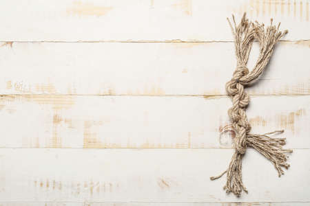 Rope with knots on light backgroundの写真素材