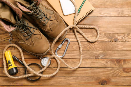 Set of travel items on wooden background