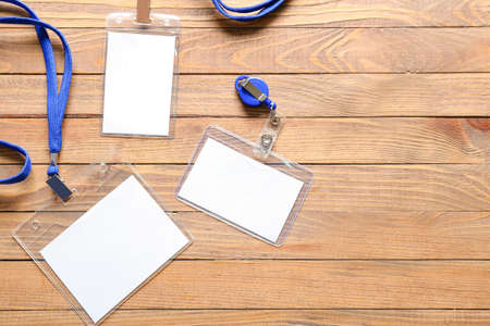 Blank badges on wooden backgroundの写真素材