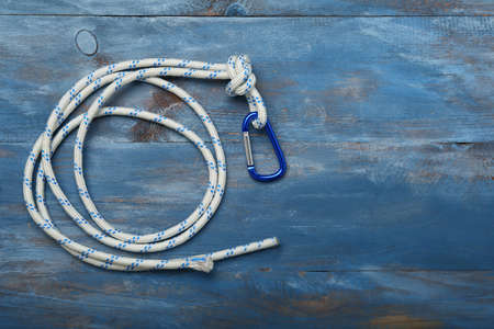 Rope with lobster clasp on color backgroundの写真素材