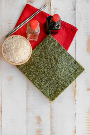 Composition with rice vinegar on wooden backgroundの写真素材