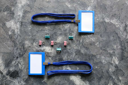 Blank badges and stationery on table