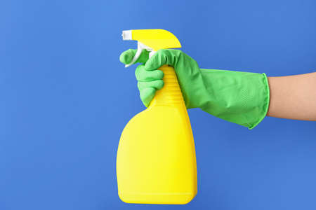 Hand with detergent on color backgroundの写真素材