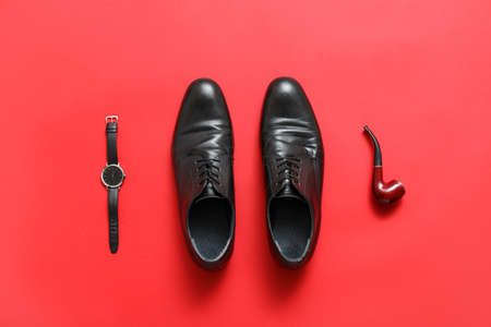 Classic leather male shoes on color backgroundの写真素材