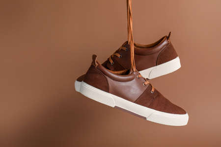 Casual male shoes on color backgroundの写真素材