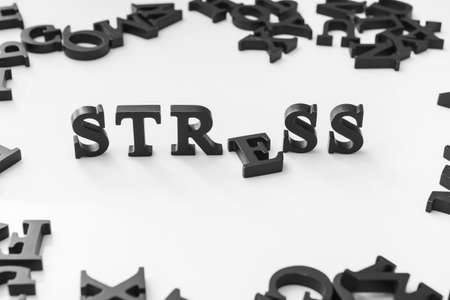Composition with word STRESS on light background