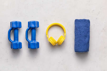 Set of sport equipment on light background