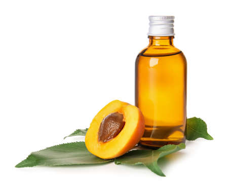 Bottle of apricot essential oil on white backgroundの写真素材