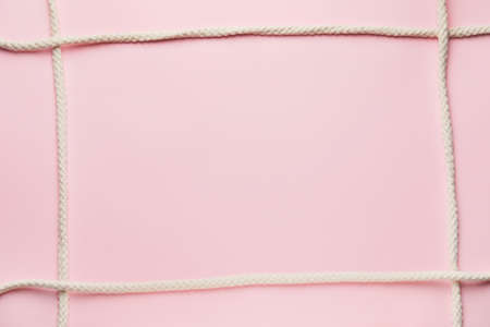 Frame made of rope on color backgroundの写真素材