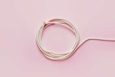 Long rope on color background