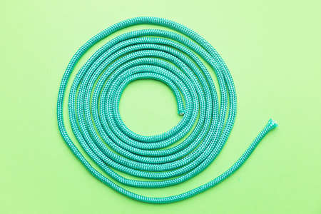 Long rope on color background