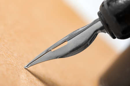 Nib pen and paper sheet, closeupの写真素材