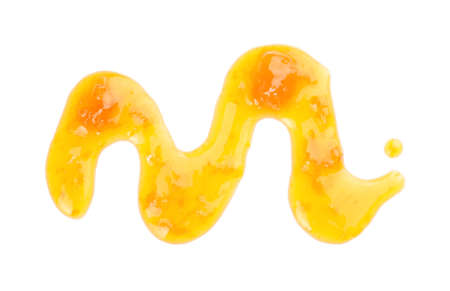 Tasty apricot jam on white backgroundの写真素材