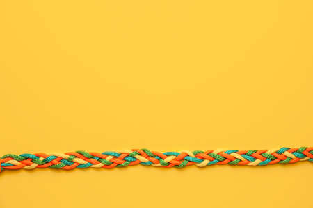 Braided ropes on color backgroundの写真素材