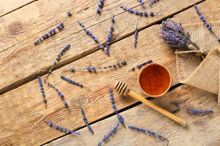 Lavender bouquet with honey on wooden backgroundの写真素材