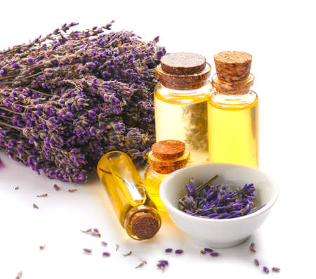 Bottles with lavender essential oil on white backgroundの写真素材