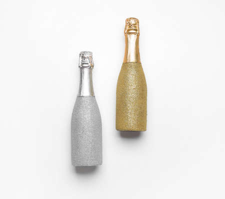 Bottles of champagne on white background. New Year celebrationの写真素材