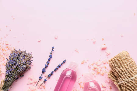 Composition with lavender bouquet and bath products on color backgroundの写真素材