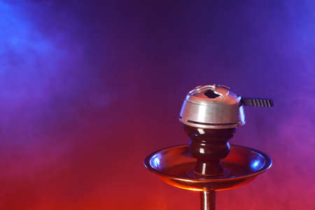 Hookah bowl on dark background, closeup