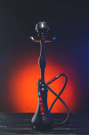 Hookah with fume on dark backgroundの写真素材
