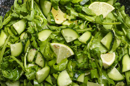 Tasty cucumber salad as backgroundの写真素材