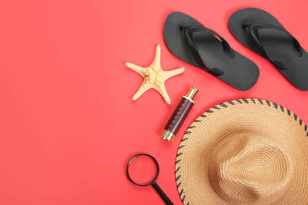 Male beach accessories on color backgroundの写真素材