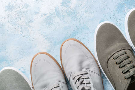 Casual male shoes on color backgroundの写真素材