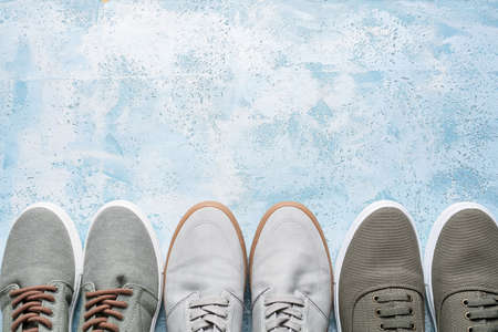 Casual male shoes on color backgroundの写真素材