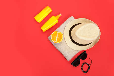 Male beach accessories on color background