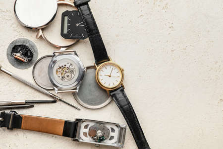 Watches and tools for repair on light backgroundの写真素材