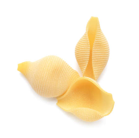 Uncooked pasta isolated on white backgroundの写真素材