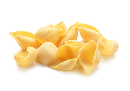 Uncooked pasta isolated on white backgroundの写真素材