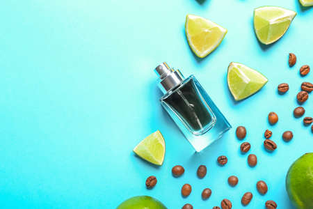Composition with bottle of perfume on color backgroundの写真素材
